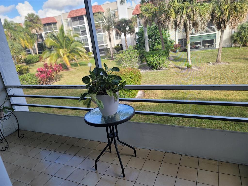 3774 Inverrary Boulevard, Unit P202 Lauderhill, FL 33319 - Photo 12 of 31 a view of outdoor seating area