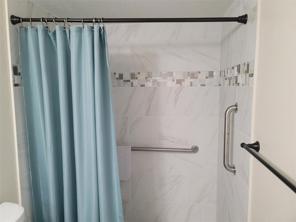 3774 Inverrary Boulevard, Unit P202 Lauderhill, FL 33319 - Photo 22 of 31 a bathroom with a shower