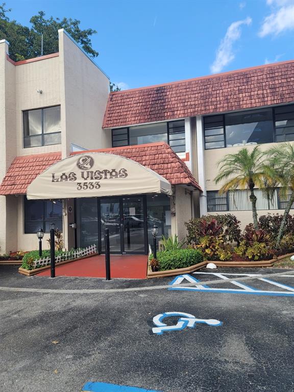 3774 Inverrary Boulevard, Unit P202 Lauderhill, FL 33319 - Photo 25 of 31 a view of a building with street