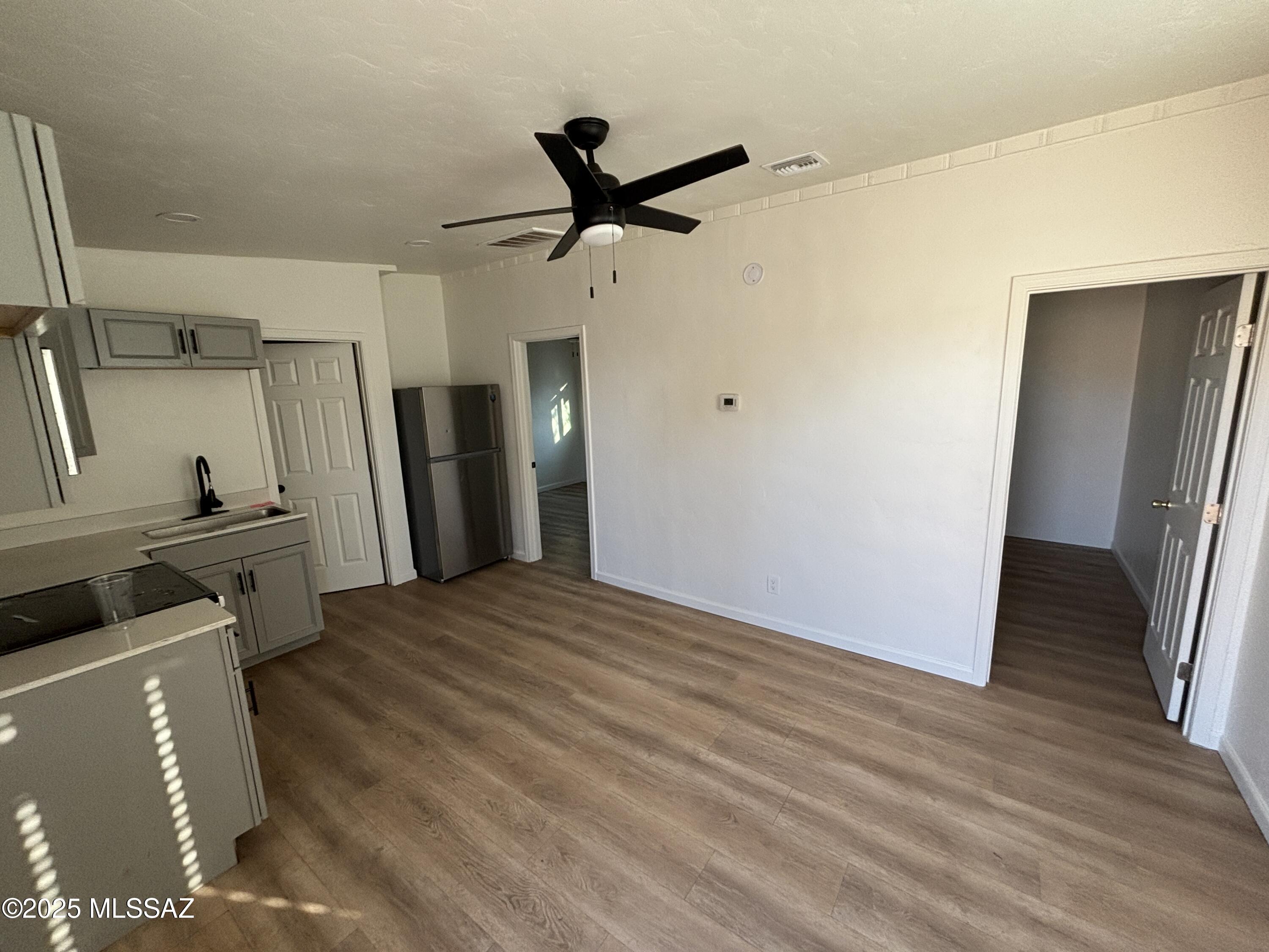 326 East Prince Road, Unit 3 Tucson, AZ 85705 - Photo 3 of 13 Living Room/Kitchen