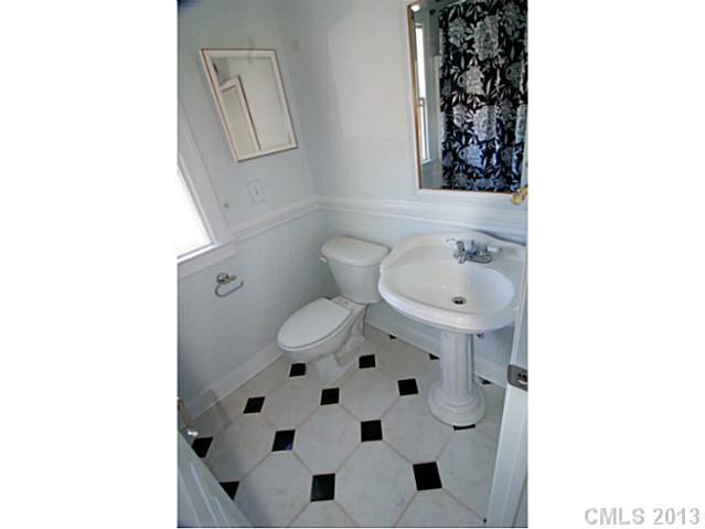 17516 Springwinds Drive Cornelius, NC 28031 - Photo 13 of 14 a bathroom with a sink toilet and shower