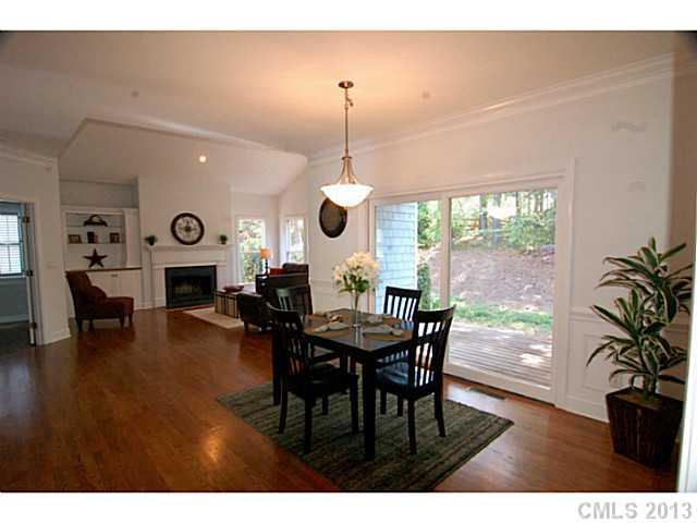 17516 Springwinds Drive Cornelius, NC 28031 - Photo 5 of 14 a dining room with furniture window and wooden floor