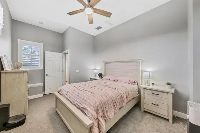 a view of a fountain in the backyard of house