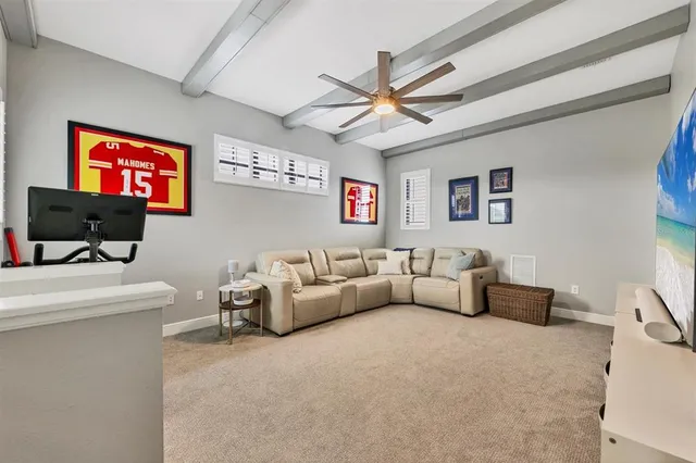an aerial view of house with yard and lake view
