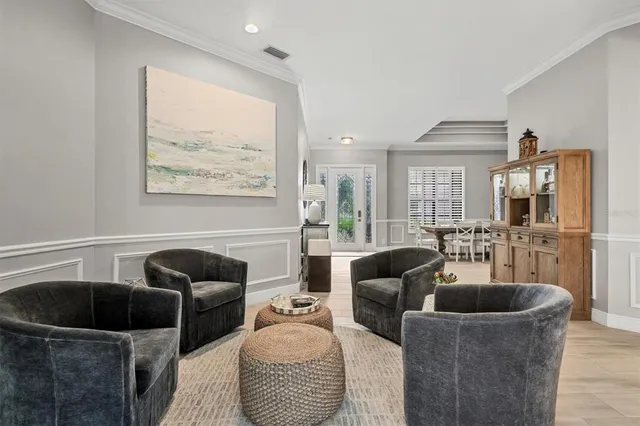 a kitchen with refrigerator a sink and cabinets