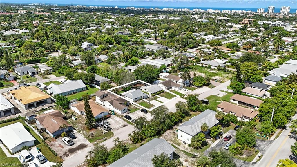 1336 Highlands Drive Naples, FL 34103 - Photo 14 of 17 an aerial view of residential houses with outdoor space