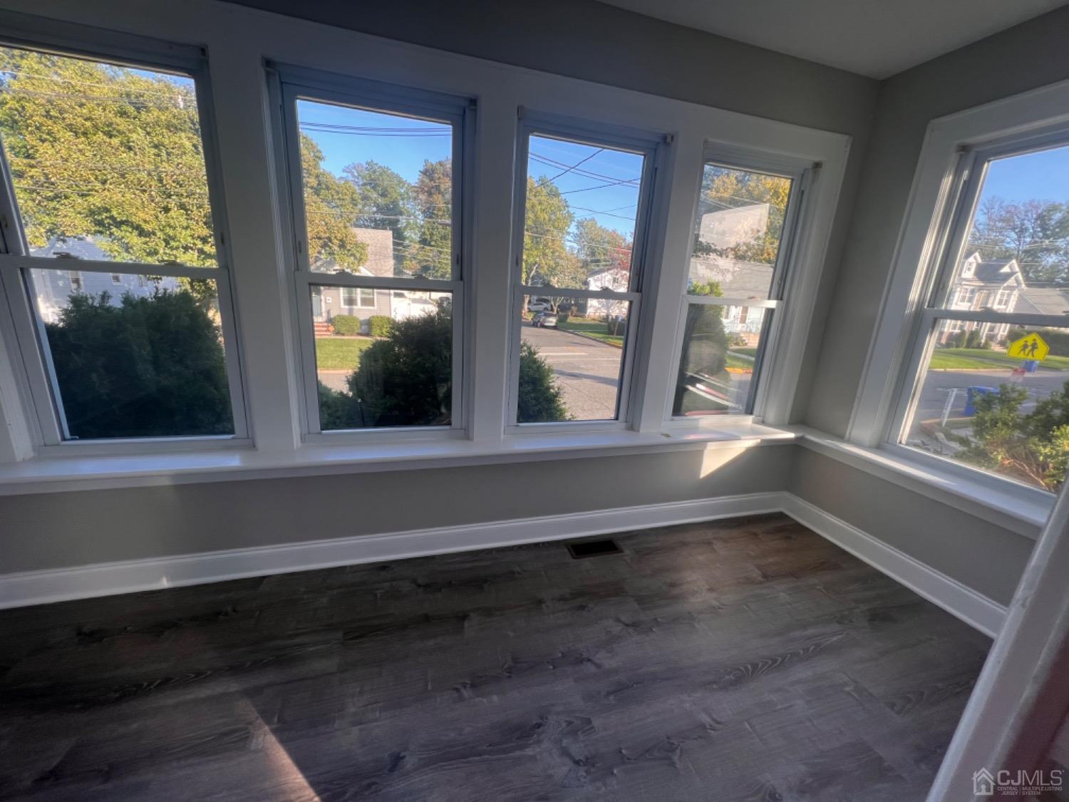 186 Old Road Sewaren, NJ 07077 - Photo 6 of 7 a view of room with window and front door