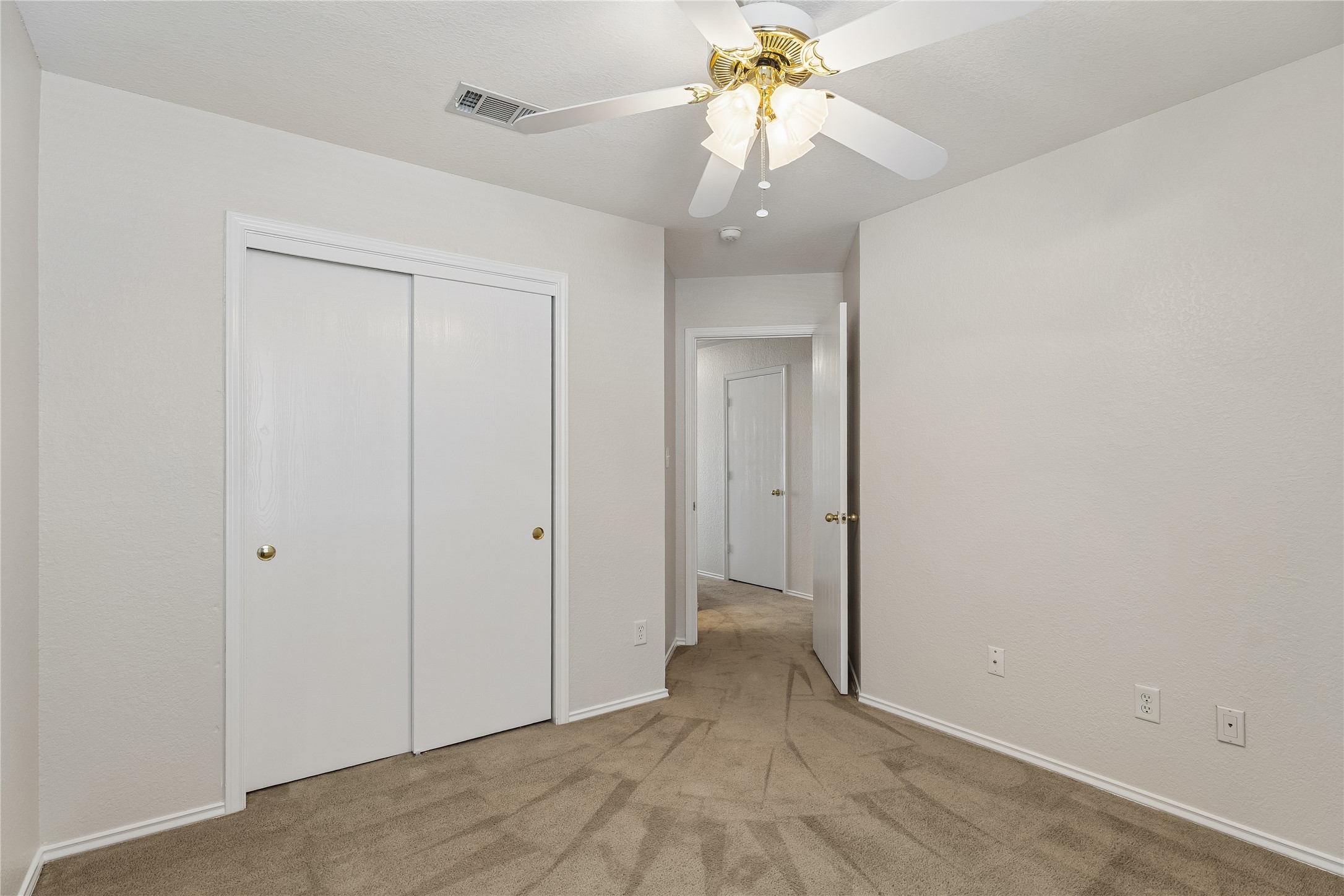104 Cavalry Trail Elgin, TX 78621 - Photo 19 of 26 Bedroom 3 with ceiling fan.