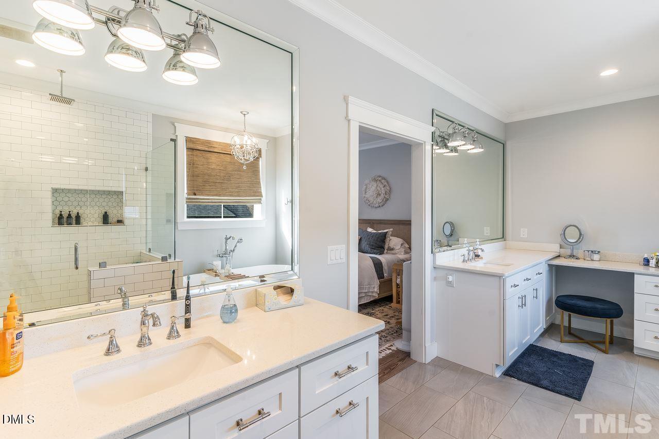 107 Cres Hill Lane Rougemont, NC 27572 - Photo 12 of 28 a spacious bathroom with a double vanity sink mirror and bathtub