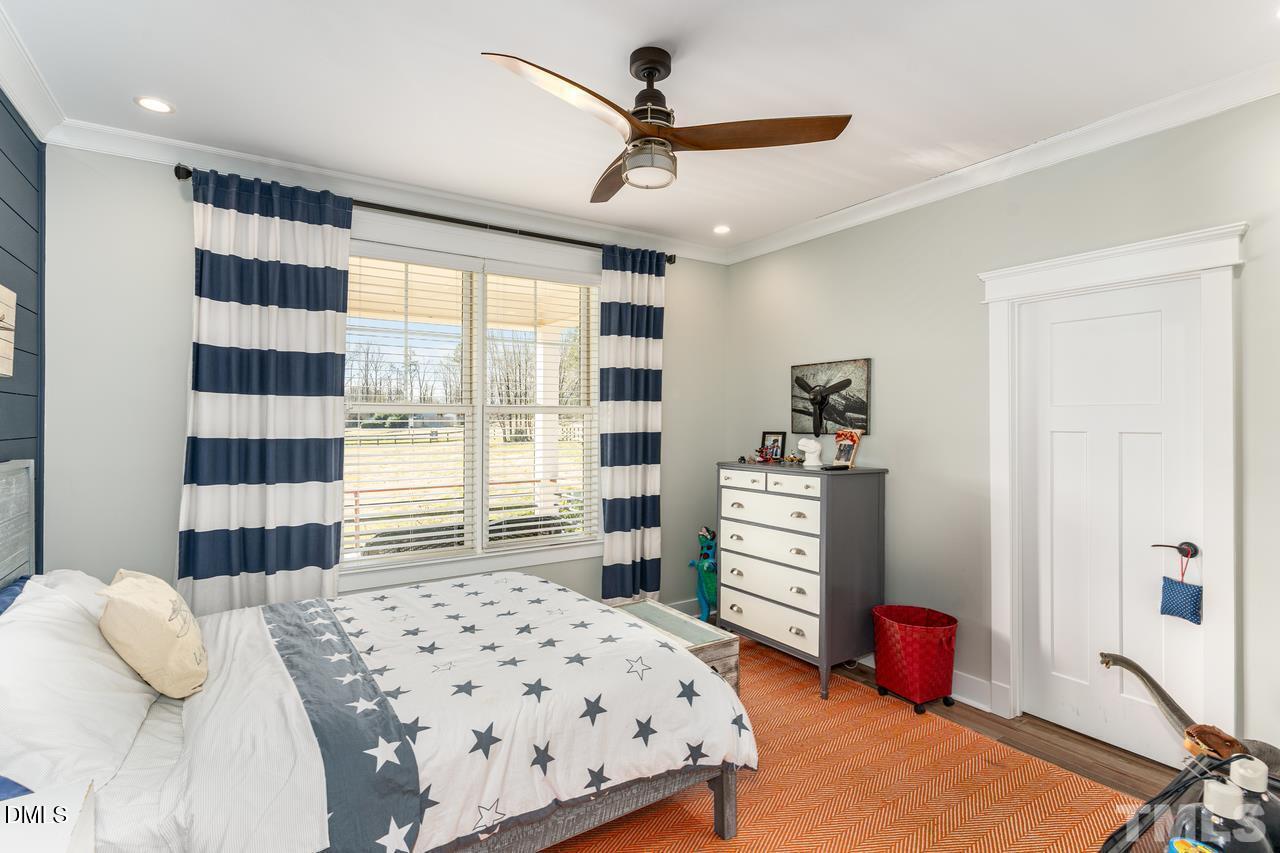 107 Cres Hill Lane Rougemont, NC 27572 - Photo 19 of 28 a bedroom with a bed and a dresser