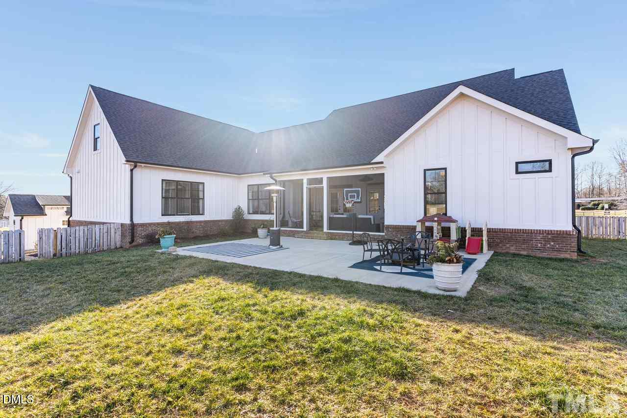 107 Cres Hill Lane Rougemont, NC 27572 - Photo 26 of 28 a view of a house with backyard and sitting area