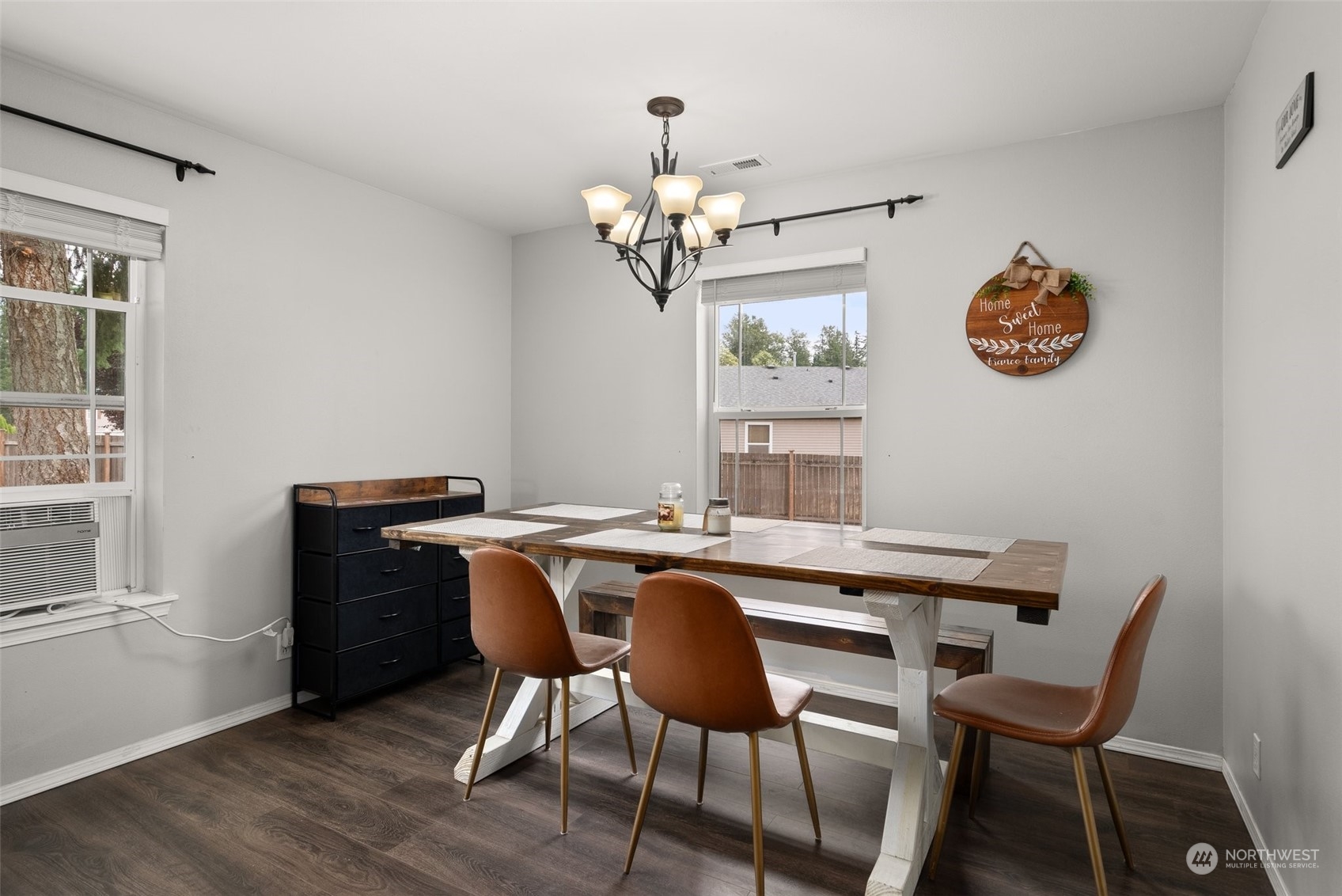 413 Easy Street Rainier, WA 98576 - Photo 12 of 30 a view of a dining room with a table and chairs