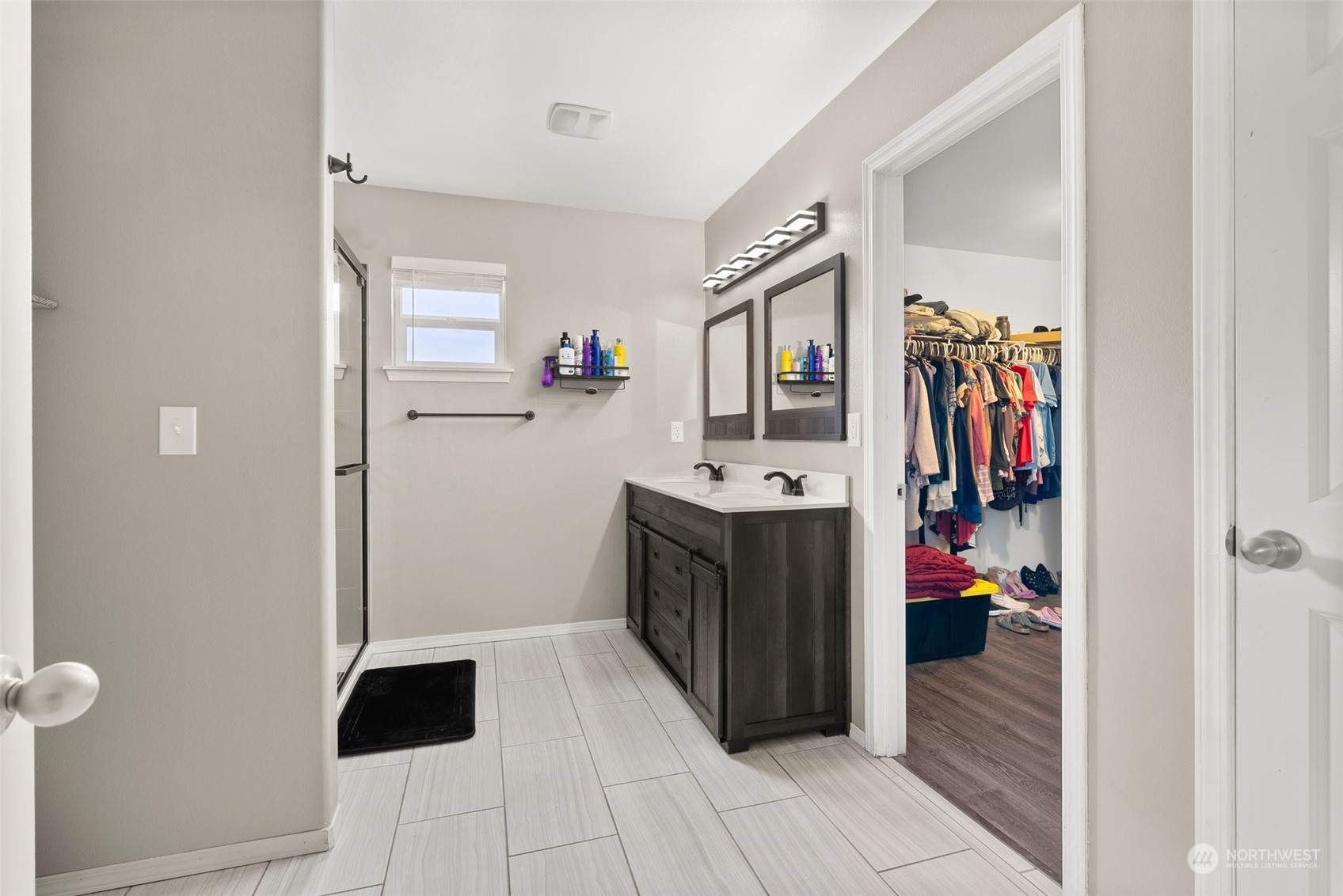 413 Easy Street Rainier, WA 98576 - Photo 17 of 30 a bathroom with a sink and a mirror