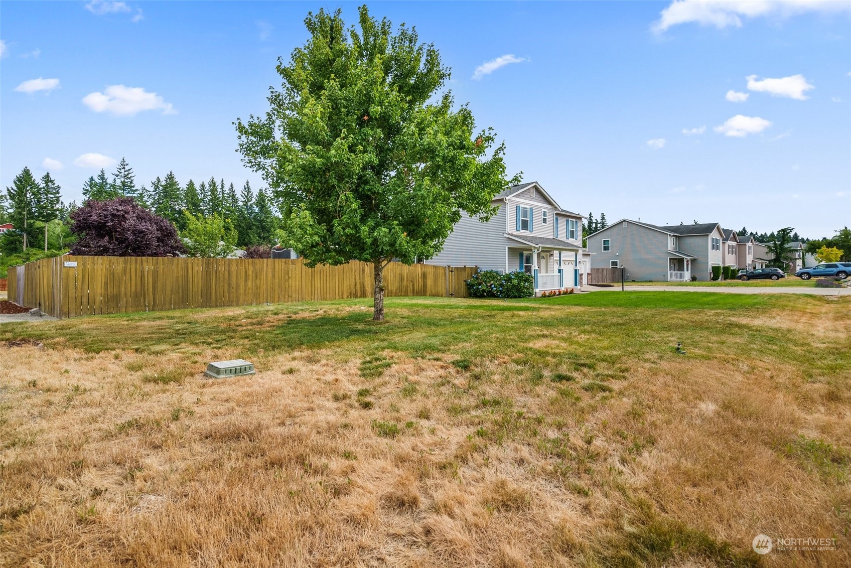 413 Easy Street Rainier, WA 98576 - Photo 29 of 30 a view of a house with a big yard