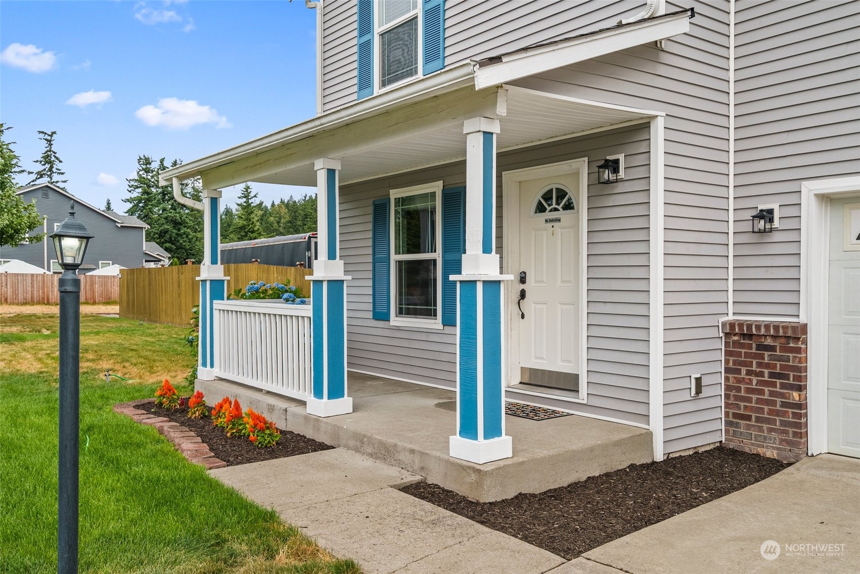 413 Easy Street Rainier, WA 98576 - Photo 4 of 30 a front view of a house with garden