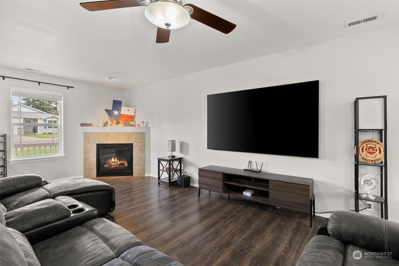 413 Easy Street Rainier, WA 98576 - Photo 8 of 30 a living room with furniture and a flat screen tv