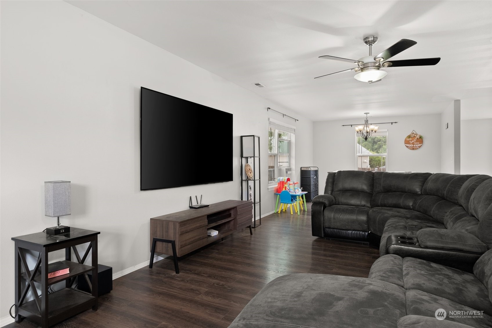 413 Easy Street Rainier, WA 98576 - Photo 10 of 30 a living room with furniture and a flat screen tv