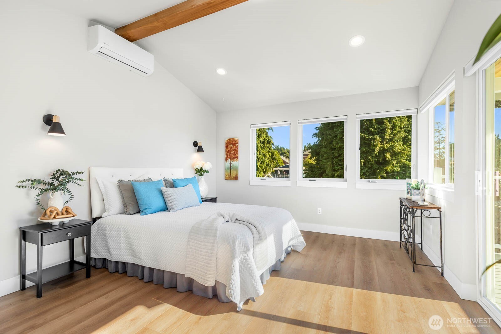 4326 Southwest Mills Street Seattle, WA 98136 - Photo 21 of 37 a bedroom with a bed and a large window