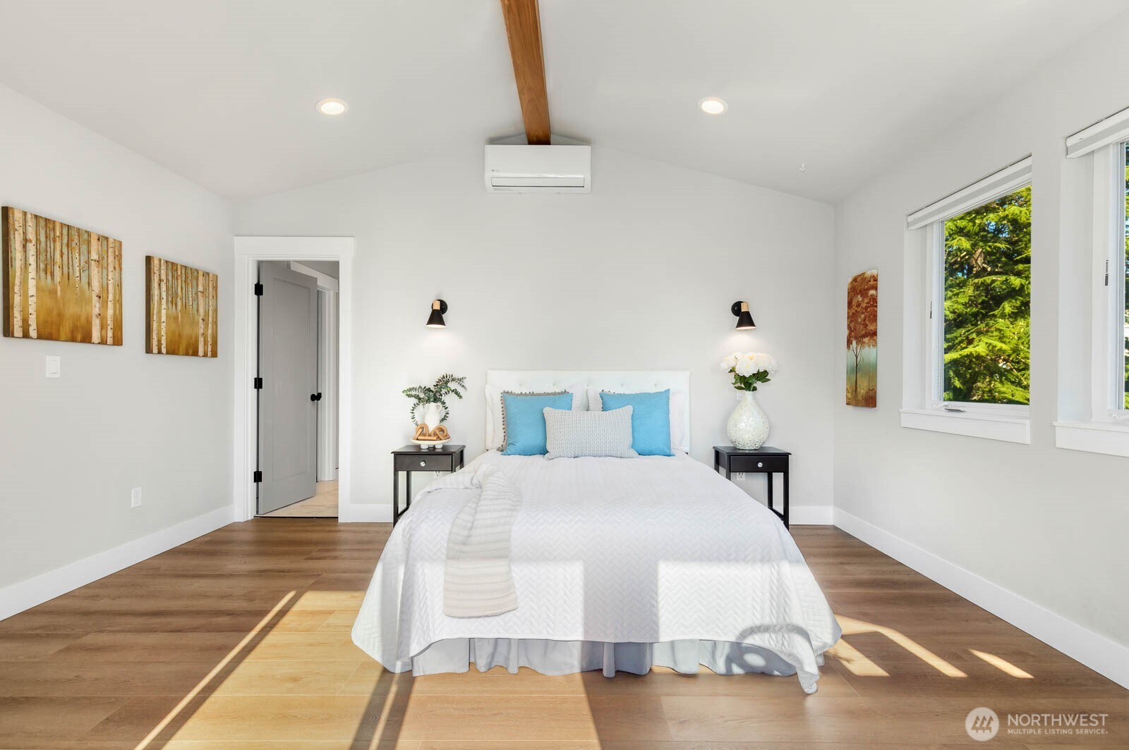4326 Southwest Mills Street Seattle, WA 98136 - Photo 22 of 37 a bedroom with a bed dresser and a window