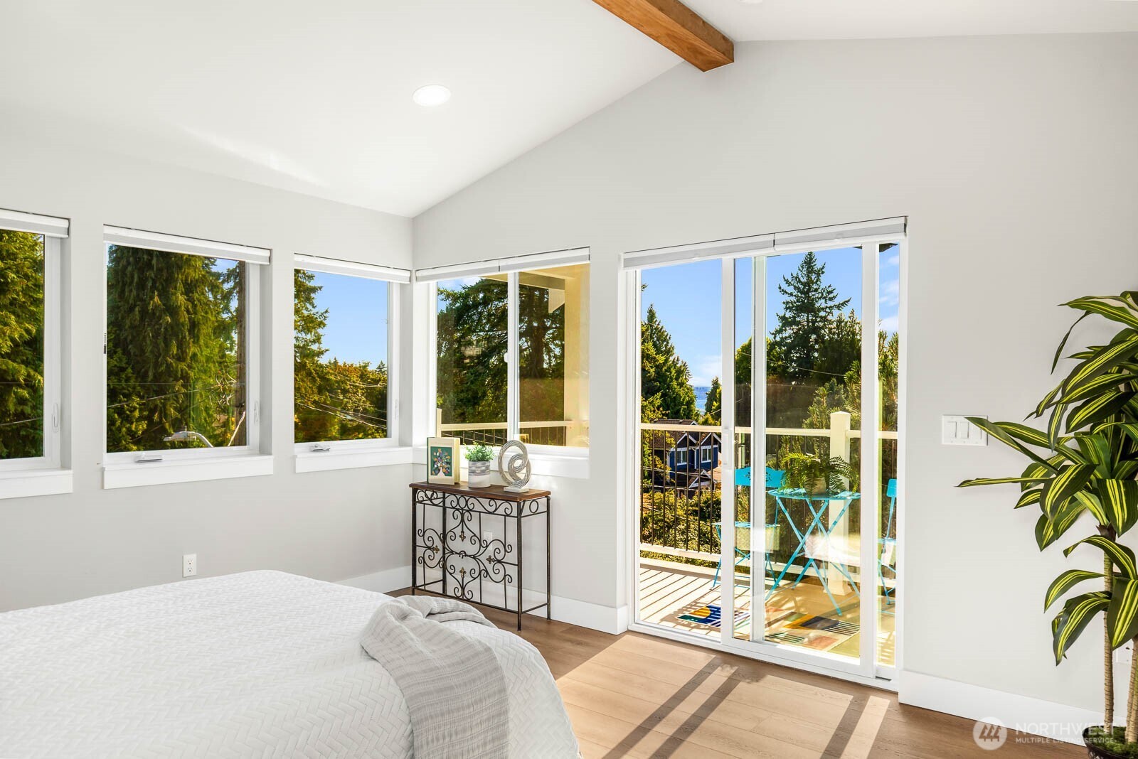 4326 Southwest Mills Street Seattle, WA 98136 - Photo 24 of 37 a bedroom with furniture and a large window