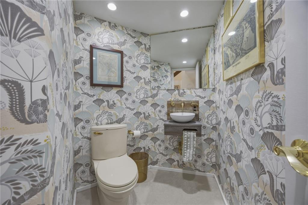5535 Forbes Avenue, Unit E Pittsburgh, PA 15217 - Photo 21 of 50 a white toilet sitting next to a bathroom sink