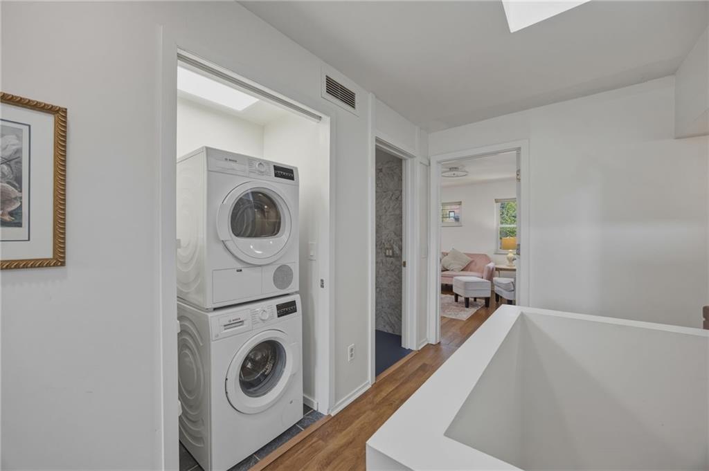 5535 Forbes Avenue, Unit E Pittsburgh, PA 15217 - Photo 25 of 50 a view of a bedroom with washer and dryer