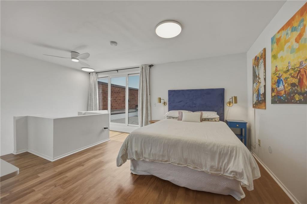 5535 Forbes Avenue, Unit E Pittsburgh, PA 15217 - Photo 34 of 50 a bedroom with a large bed and a window