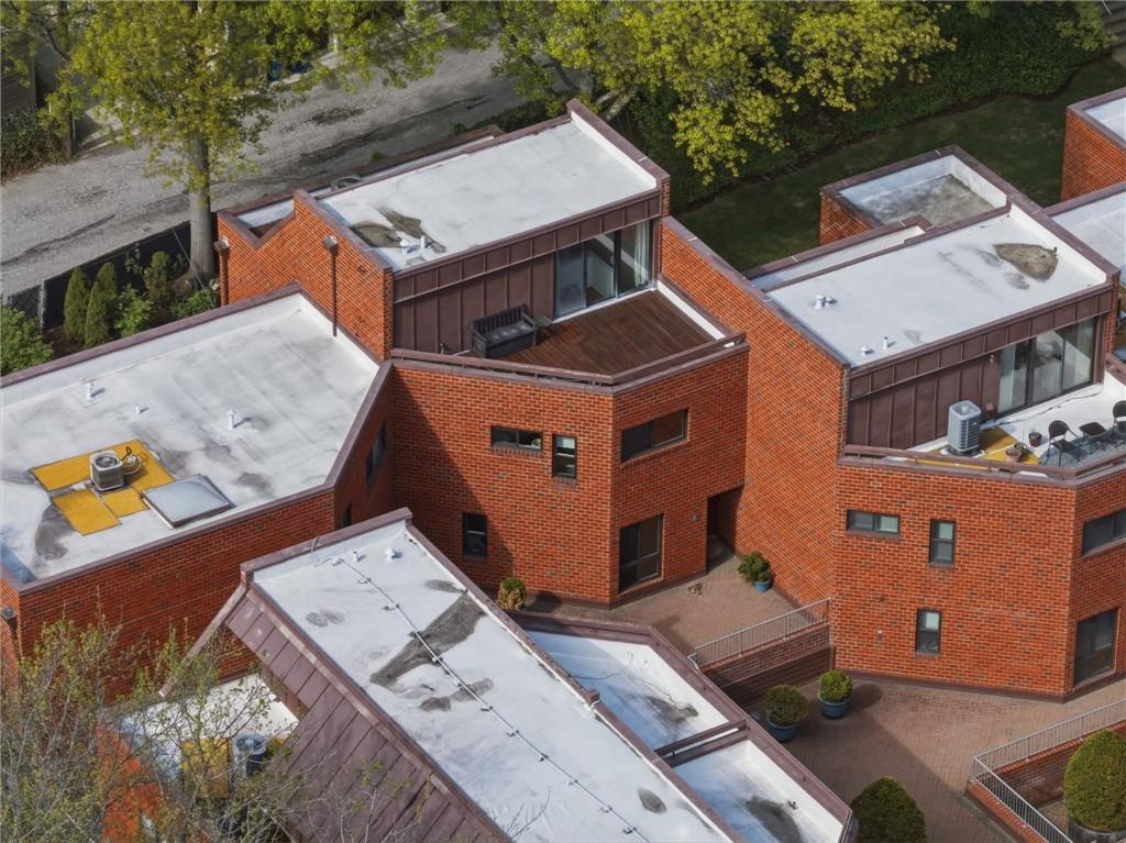 5535 Forbes Avenue, Unit E Pittsburgh, PA 15217 - Photo 49 of 50 an aerial view of a house with a swimming pool