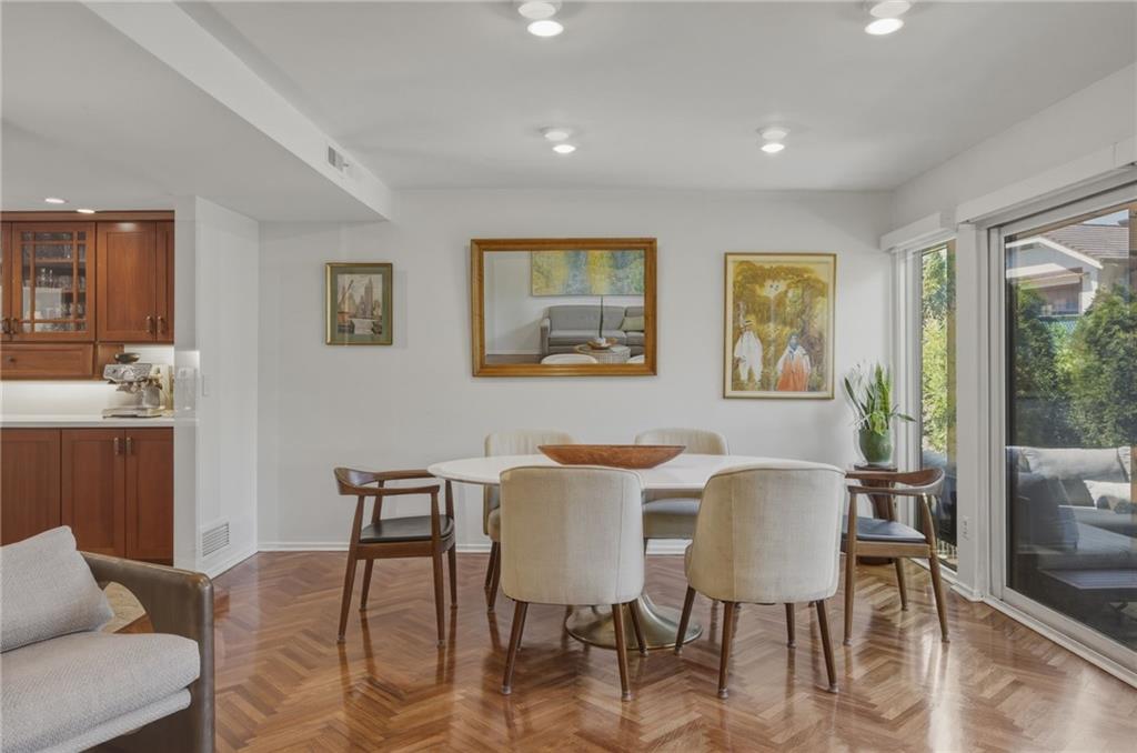 5535 Forbes Avenue, Unit E Pittsburgh, PA 15217 - Photo 7 of 50 a view of a dining room with furniture and wooden floor