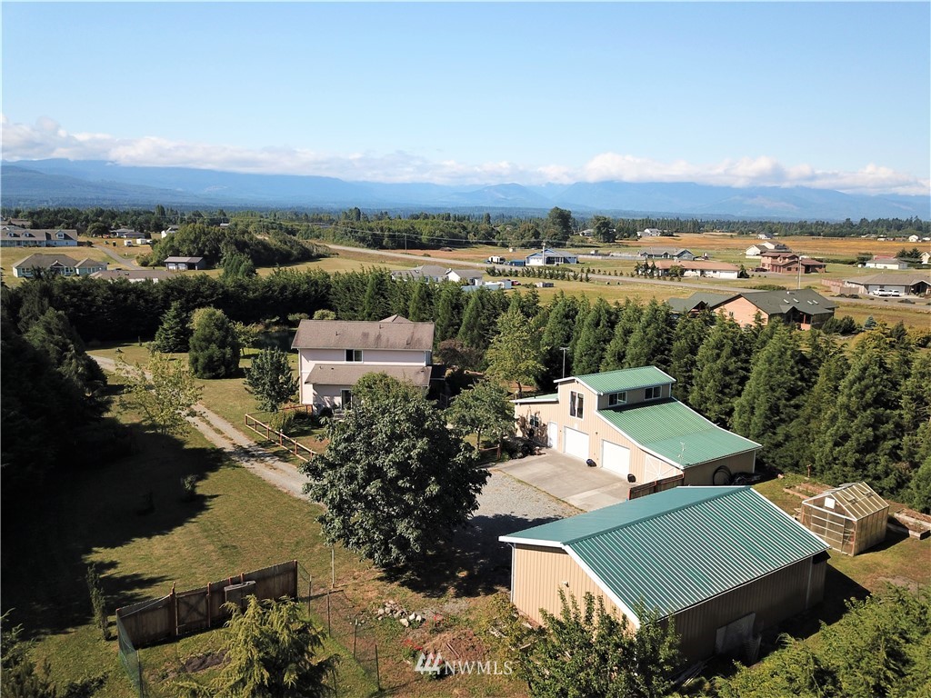 139 Buckhorn Road Sequim, WA 98382 - Photo 2 of 29 an aerial view of a house with a garden