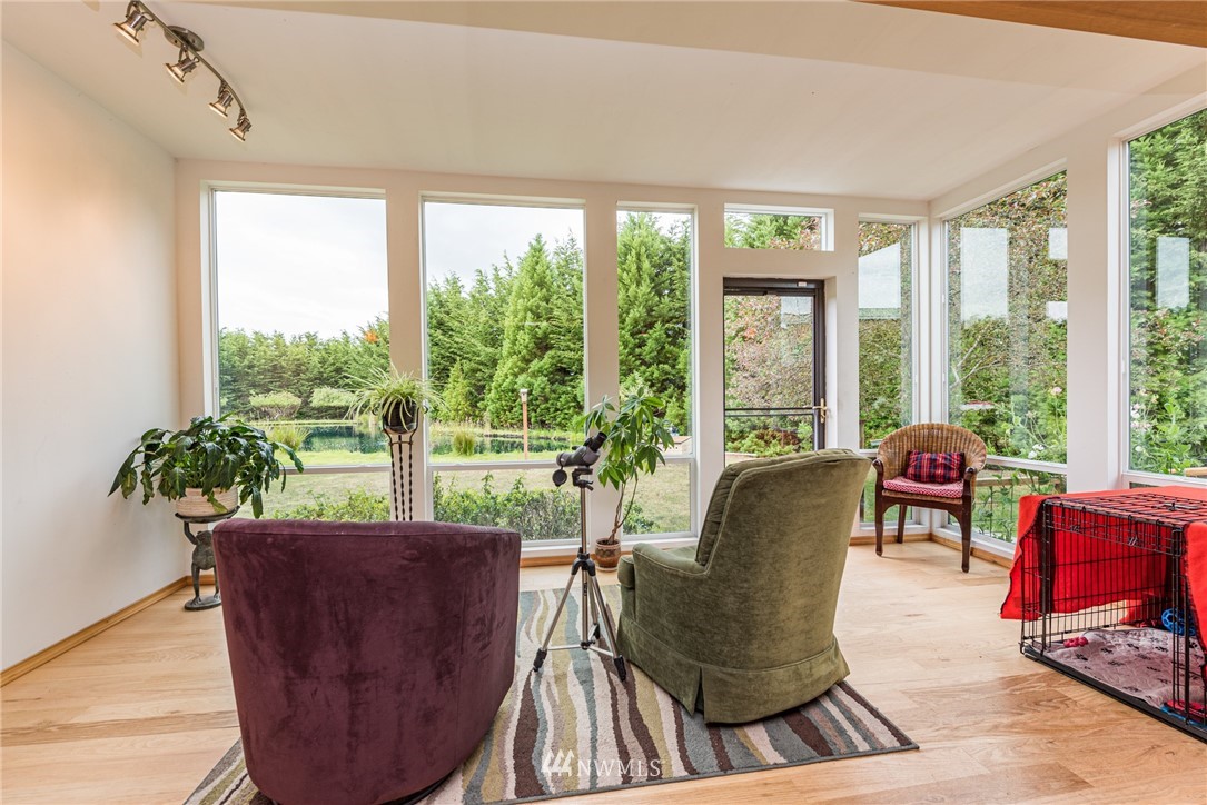 139 Buckhorn Road Sequim, WA 98382 - Photo 11 of 29 a living room with furniture and a potted plant