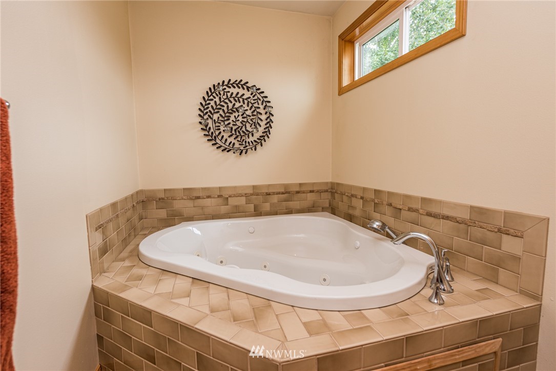 139 Buckhorn Road Sequim, WA 98382 - Photo 23 of 29 a bathroom with a sink