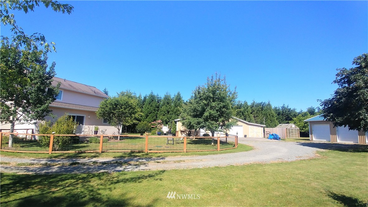139 Buckhorn Road Sequim, WA 98382 - Photo 26 of 29 a view of a house with swimming pool and sitting area