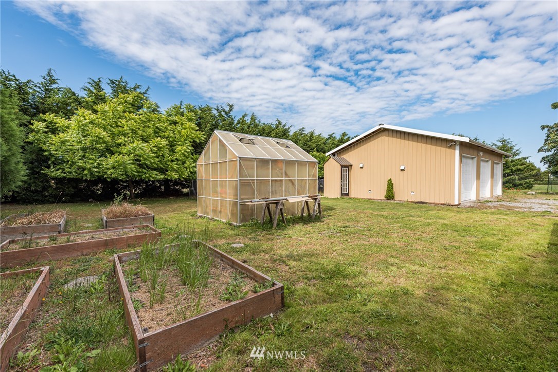 139 Buckhorn Road Sequim, WA 98382 - Photo 27 of 29 a view of a house with a yard