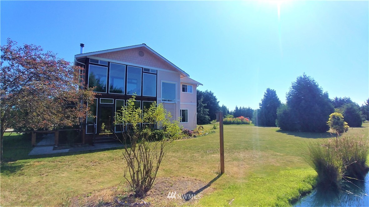 139 Buckhorn Road Sequim, WA 98382 - Photo 4 of 29 a view of a house with a yard