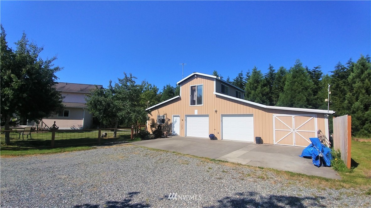 139 Buckhorn Road Sequim, WA 98382 - Photo 6 of 29 a front view of a house with a yard