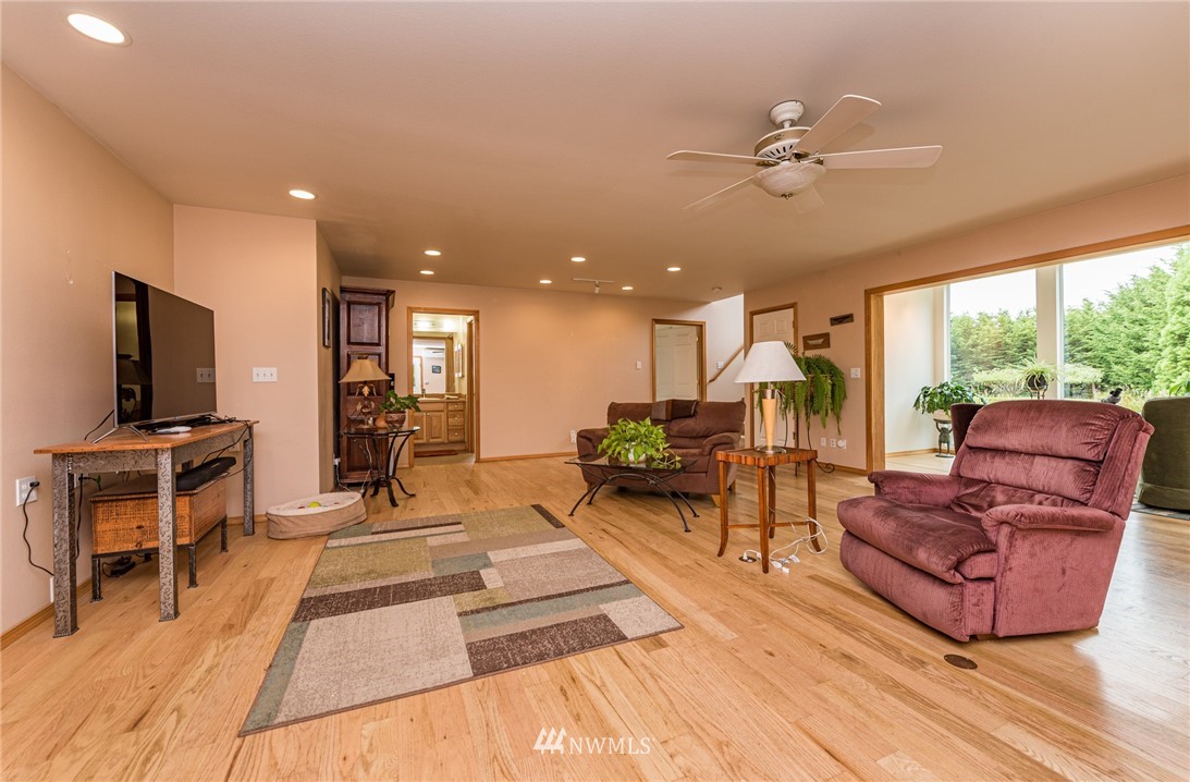139 Buckhorn Road Sequim, WA 98382 - Photo 9 of 29 a living room with furniture and a flat screen tv