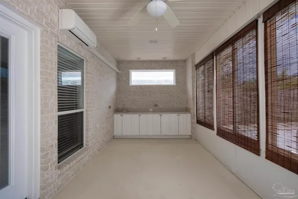 a view of entryway with kitchen