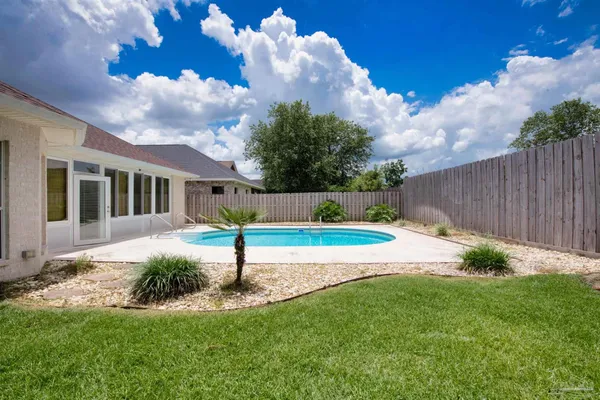 a house view with a garden space
