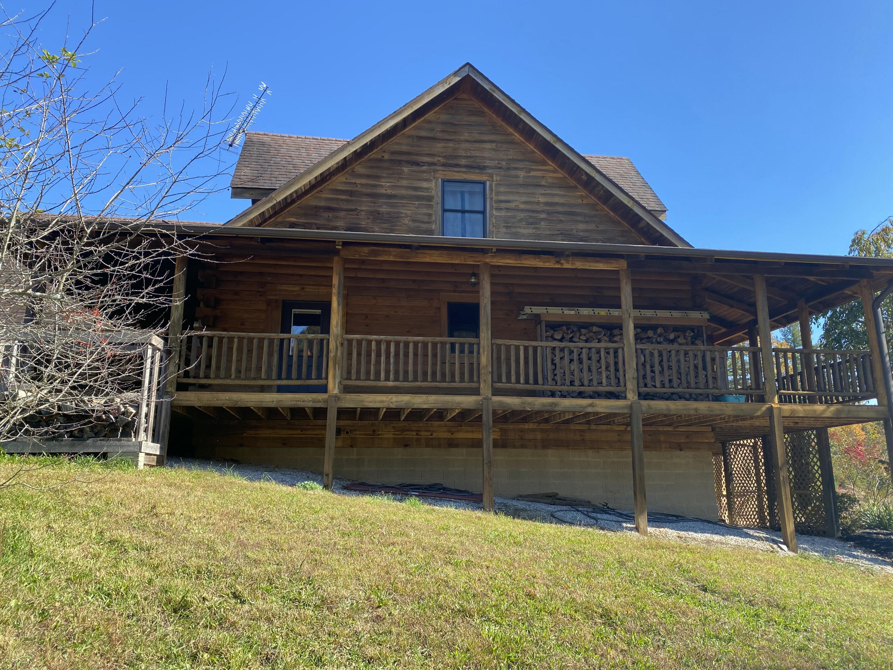 431 Harold Luke Road Campton, KY 41301 - Photo 33 of 82 033 the west side of the log home from g