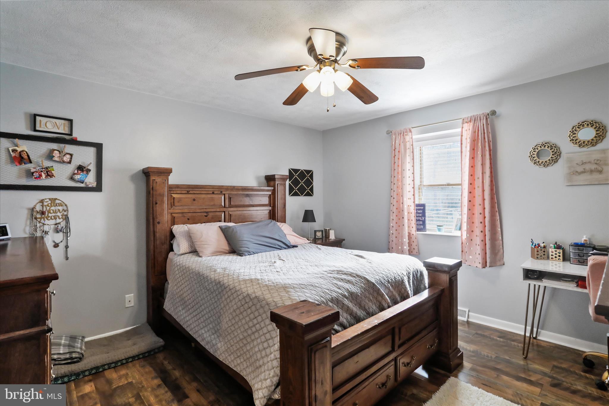 13719 Brant Road Southwest Cresaptown, MD 21502 - Photo 17 of 33 a bedroom with a bed and a chandelier