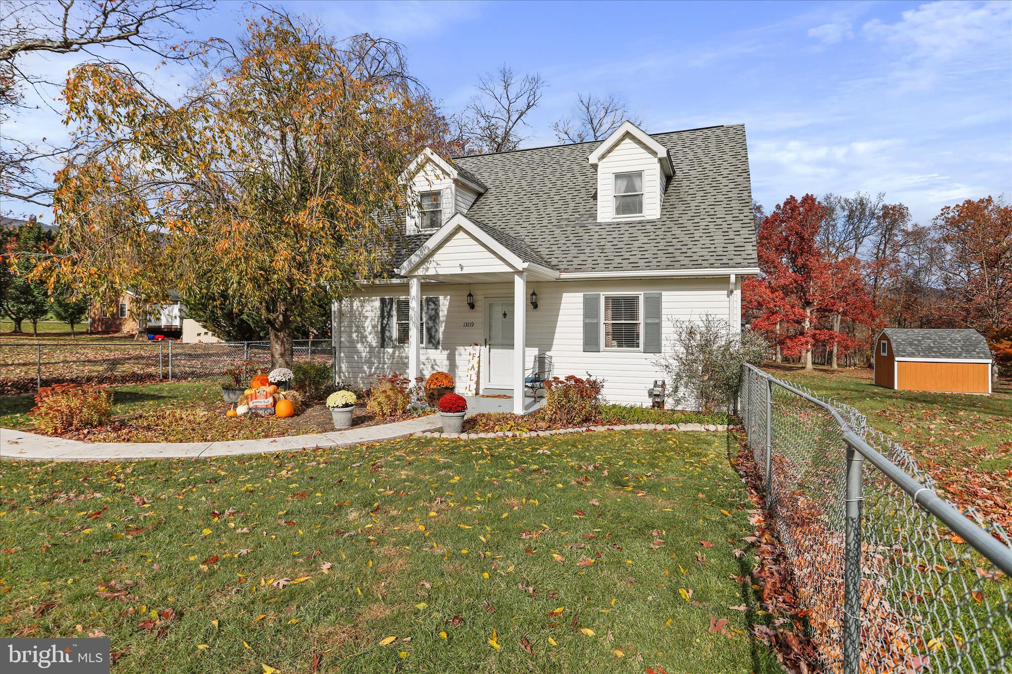 13719 Brant Road Southwest Cresaptown, MD 21502 - Photo 2 of 33 a view of a house with backyard and sitting area