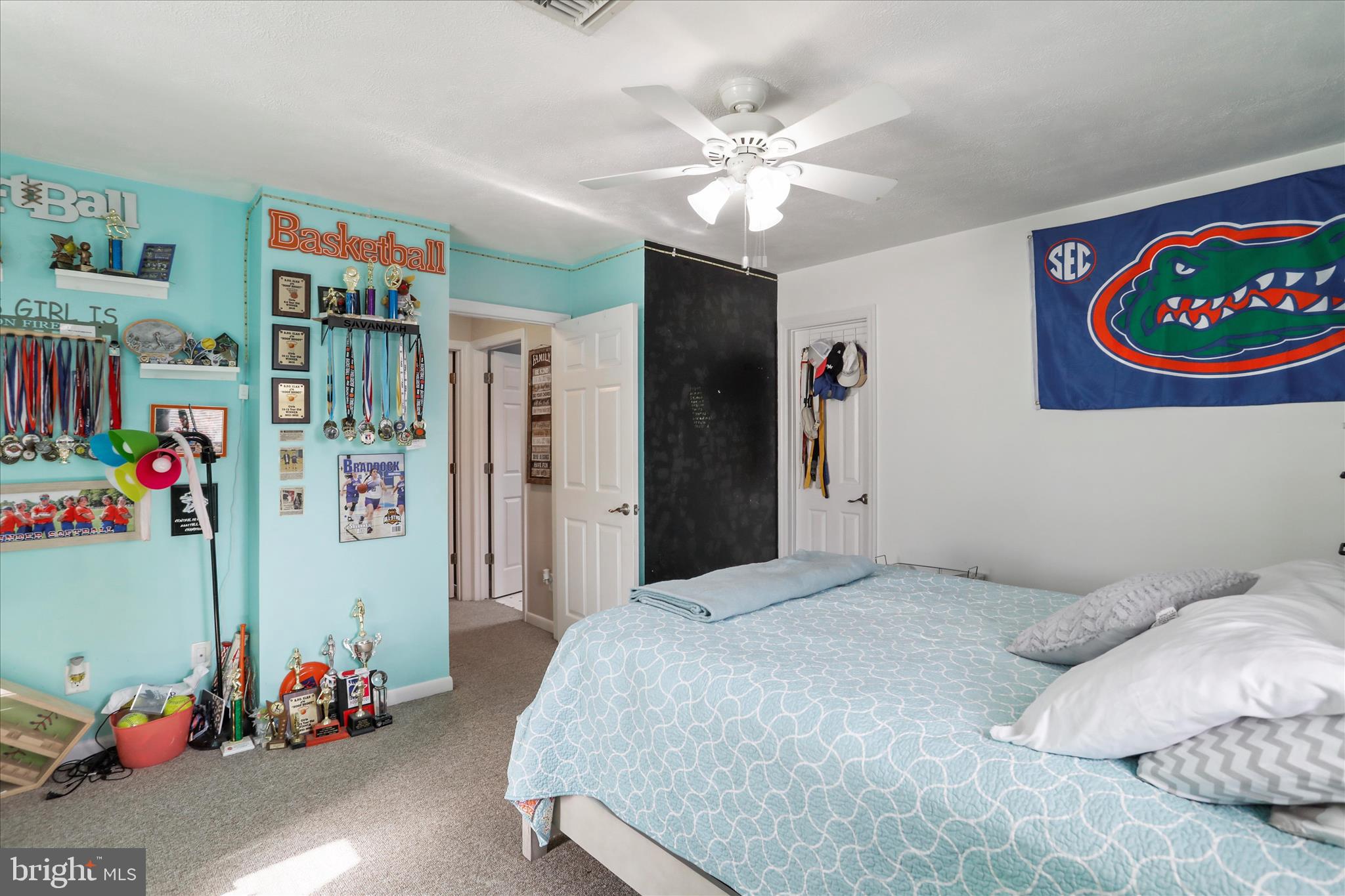 13719 Brant Road Southwest Cresaptown, MD 21502 - Photo 28 of 33 a bedroom with bed and a chandelier