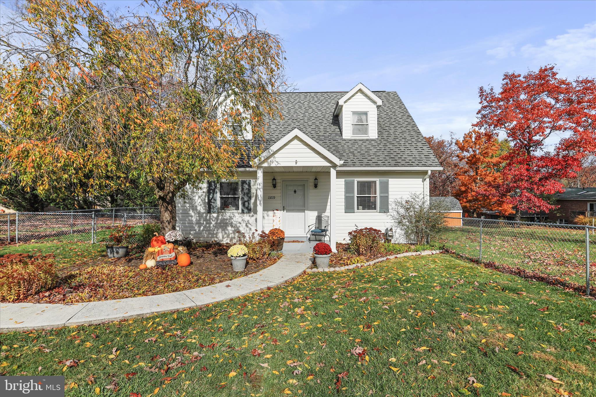 13719 Brant Road Southwest Cresaptown, MD 21502 - Photo 3 of 33 a front view of house with yard seating and green space