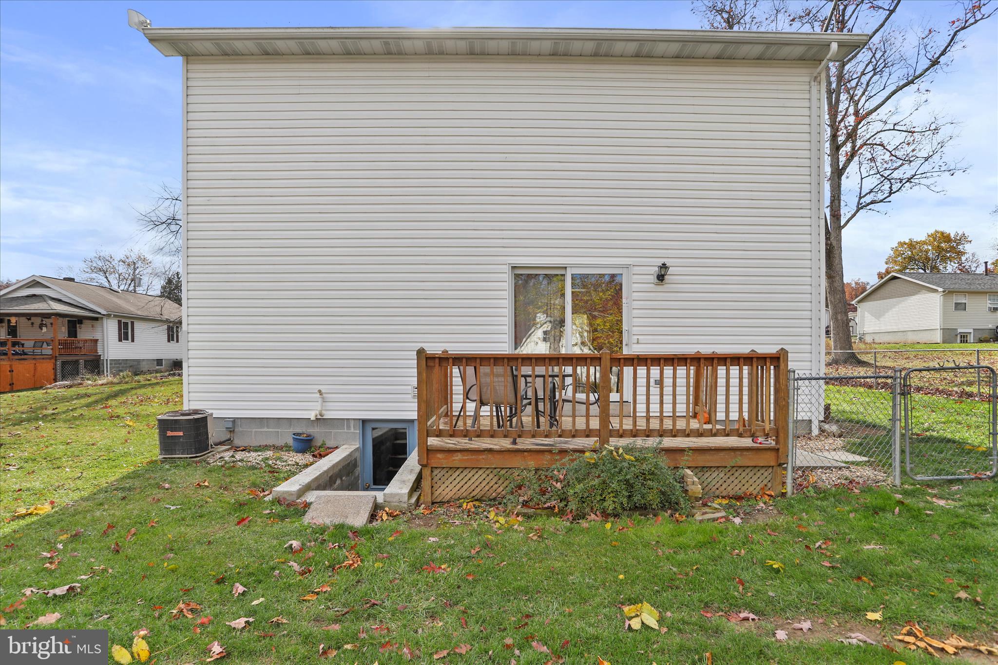 13719 Brant Road Southwest Cresaptown, MD 21502 - Photo 32 of 33 a view of a house with backyard and a chair