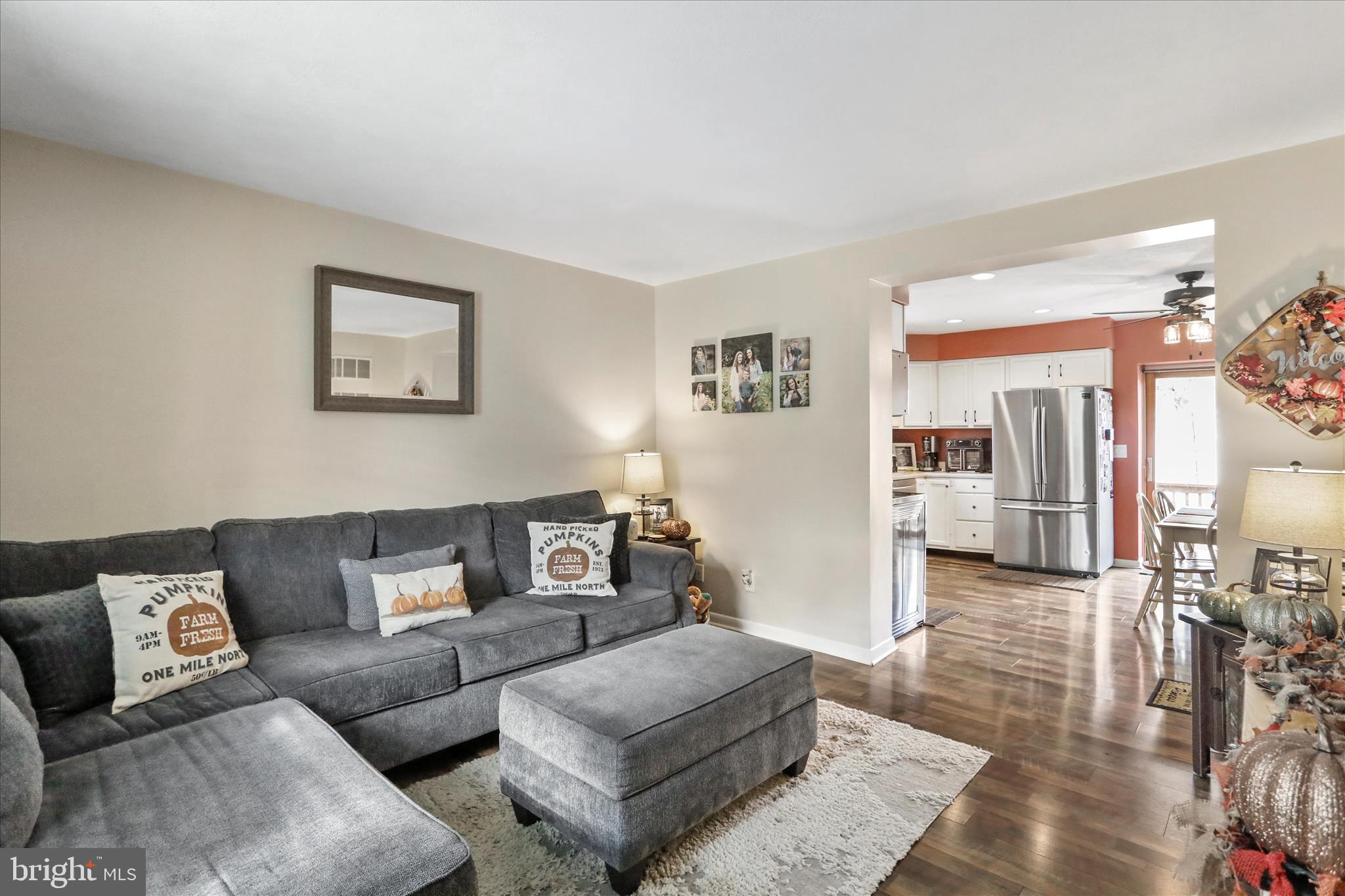 13719 Brant Road Southwest Cresaptown, MD 21502 - Photo 6 of 33 a living room with furniture and a rug