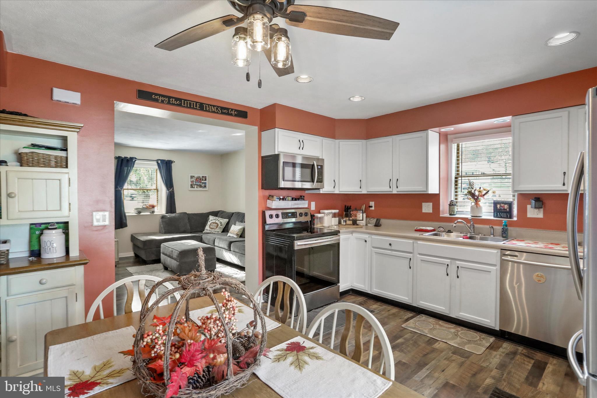 13719 Brant Road Southwest Cresaptown, MD 21502 - Photo 10 of 33 a kitchen with sink refrigerator and cabinets