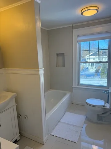 a bathroom with a sink and a bathtub