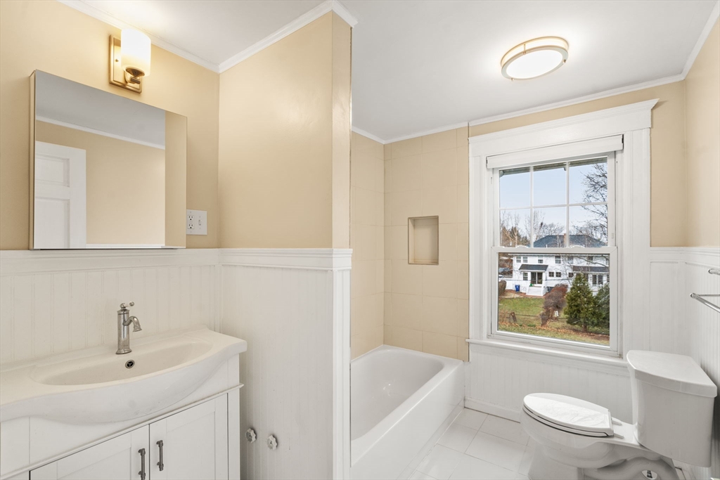 312 Edge Hill Road Milton, MA 02186 - Photo 16 of 19 a bathroom with a sink a toilet and shower