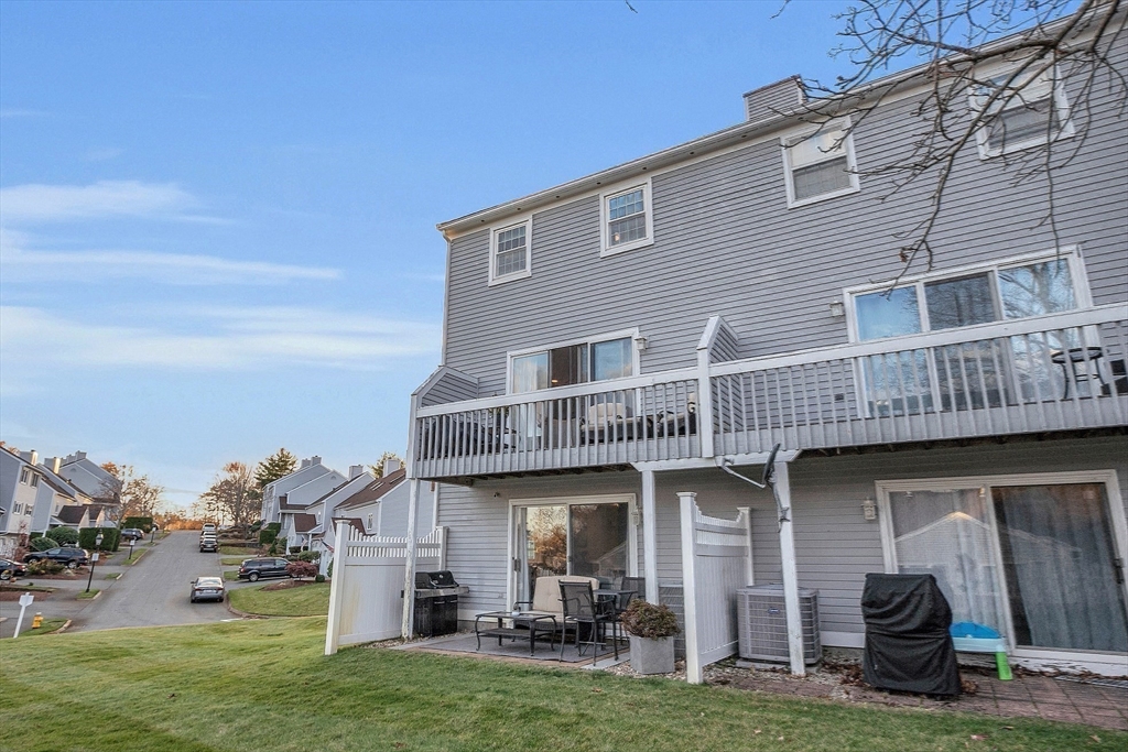 2 Countryside Lane, Unit 1301 Salem, MA 01970 - Photo 27 of 37 a view of a house with backyard porch and sitting area